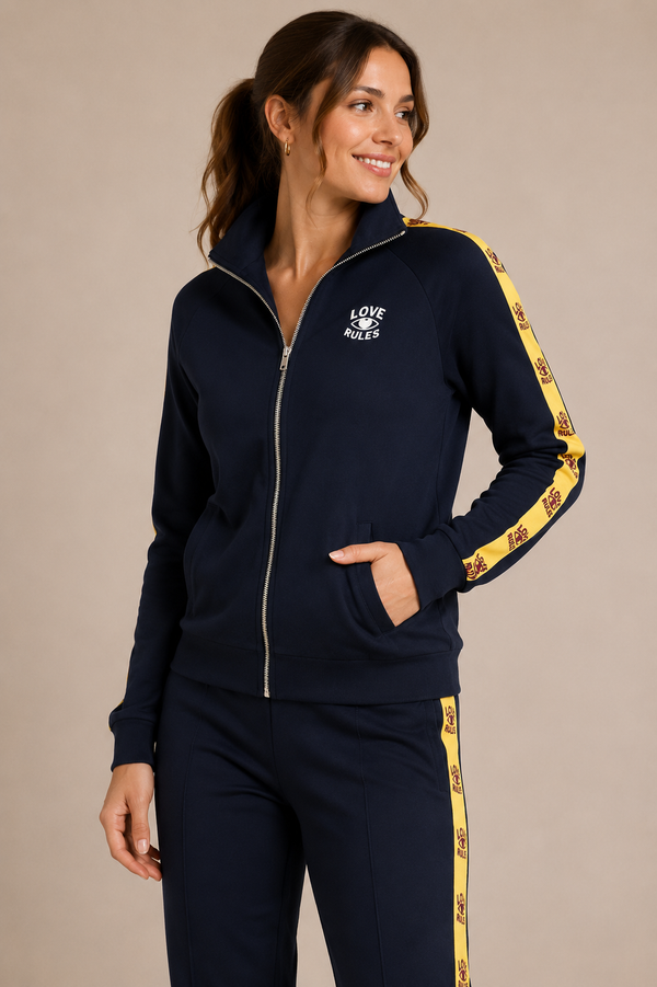 Veste track marine zippée à bandes jaunes* seconde main - Zoe Karssen- La Penderie du Paradis
