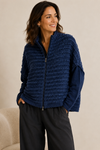 Veste ample en laine bouclée bleue à fermeture éclair* seconde main - Sarah Pacini- La Penderie du Paradis