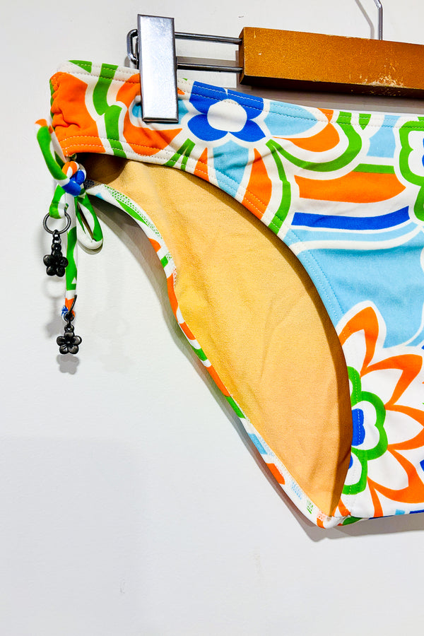 Bas de maillot de bain orange et bleu (m) -- La Penderie du Paradis ?