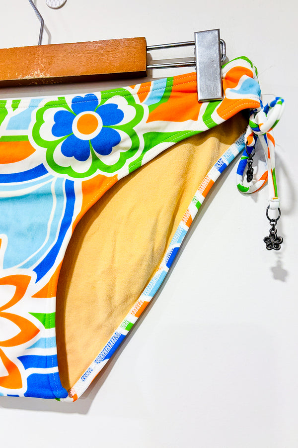 Bas de maillot de bain orange et bleu (m) -- La Penderie du Paradis ?
