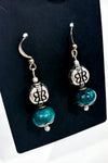 Boucles d'oreilles perle verte et papillon seconde main Autres