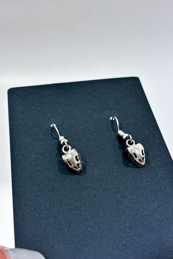 Boucles d'oreilles pendentif squelette animal argent seconde main Autres