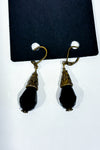 Boucles d’oreilles pendantes dorées à pierres noires facettées seconde main - Autres- La Penderie du Paradis