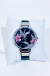 Montre noire avec cadran floral seconde main - Nine West- La Penderie du Paradis