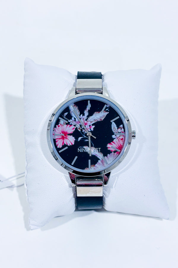 Montre noire avec cadran floral seconde main - Nine West- La Penderie du Paradis