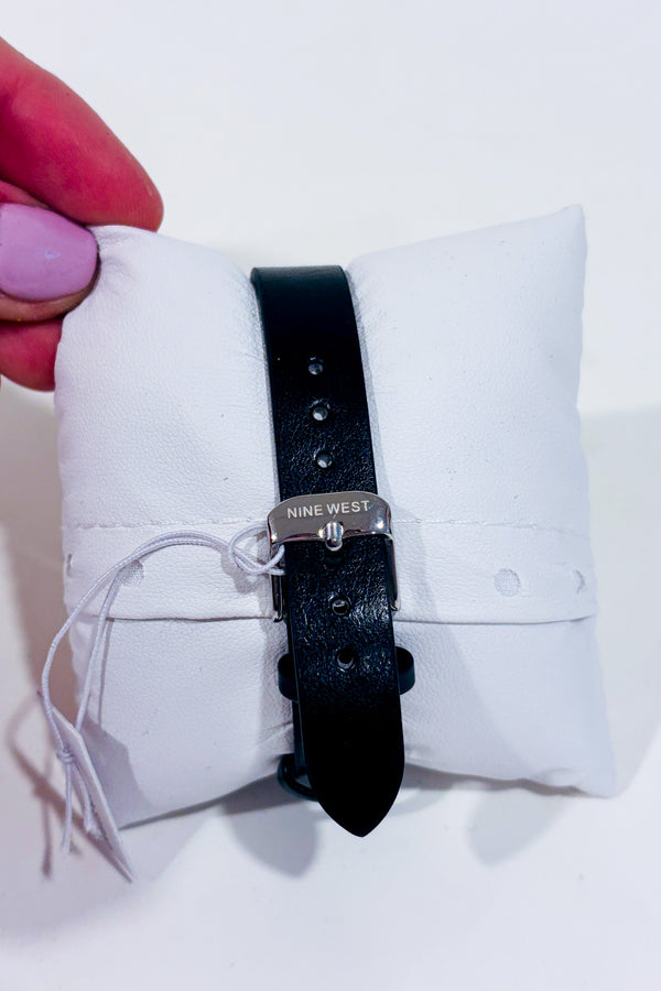 Montre noire avec cadran floral seconde main - Nine West- La Penderie du Paradis