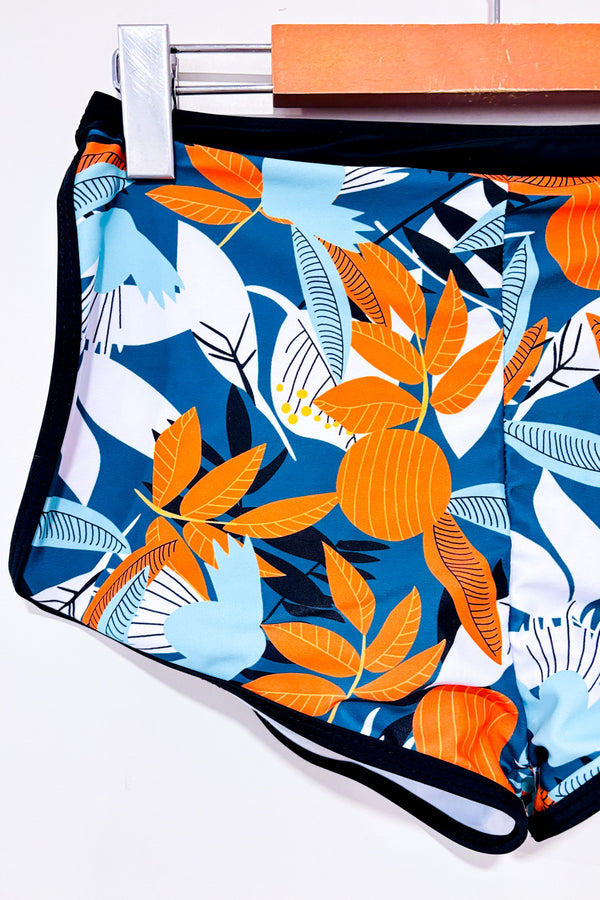 Bas de maillot de bain vert et orange fleuri seconde main - SHEIN- La Penderie du Paradis
