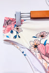Bas de maillot de bain beige fleuri seconde main - Cupshe- La Penderie du Paradis