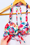 Haut de maillot de bain blanc et rose fleuri pigeonnant seconde main - H&M- La Penderie du Paradis