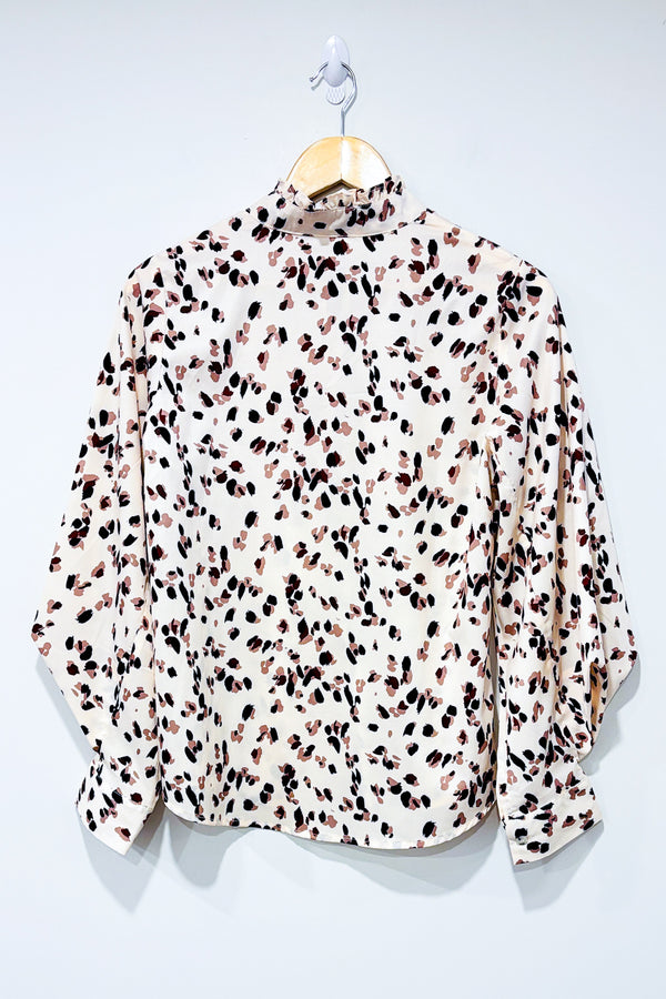 Blouse beige motif leopard avec manches bouffantes (m) -- La Penderie du Paradis ?