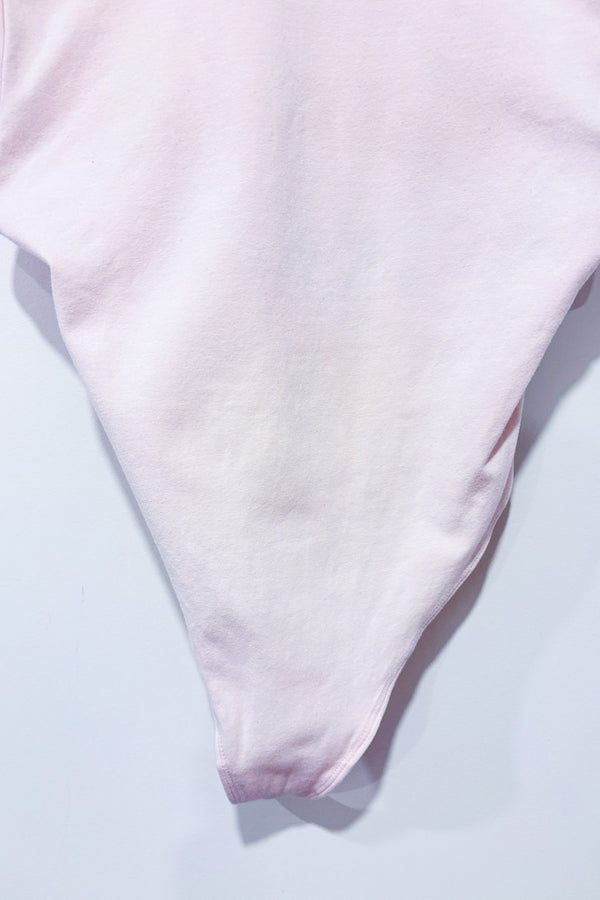 Bodysuit rose pâle seconde main - TNA- La Penderie du Paradis