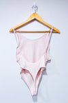 Bodysuit rose pâle seconde main - TNA- La Penderie du Paradis