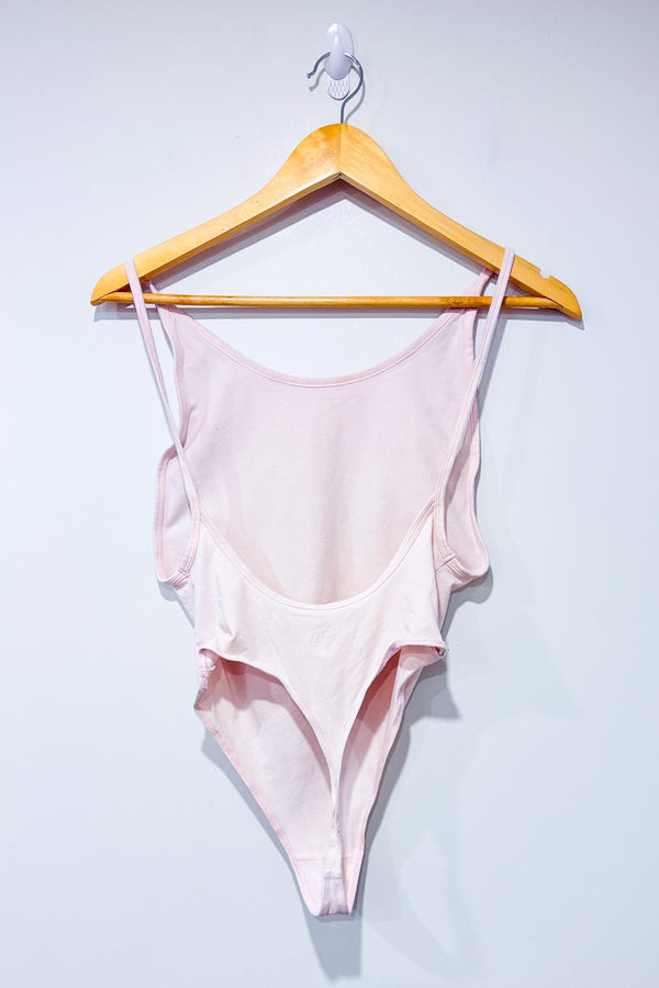Bodysuit rose pâle seconde main - TNA- La Penderie du Paradis
