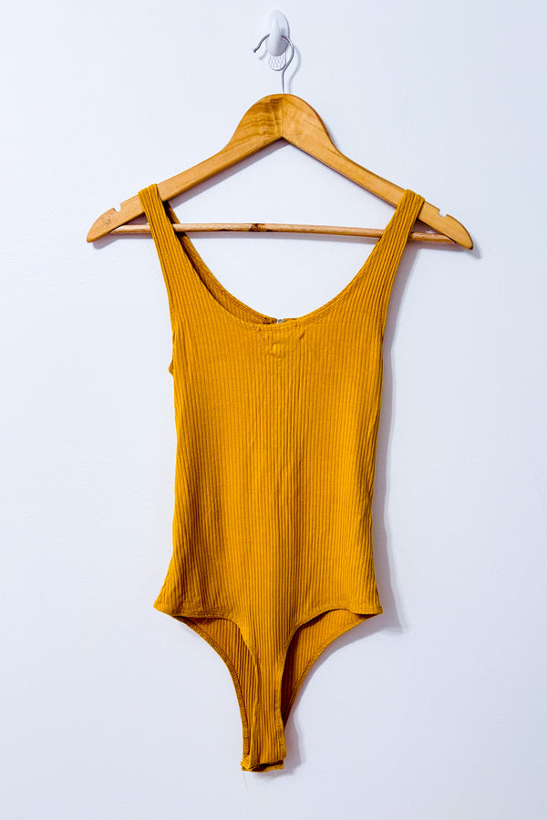 Bodysuit côtelé safran avec fermeture éclair seconde main - SWS Streetwear Society- La Penderie du Paradis