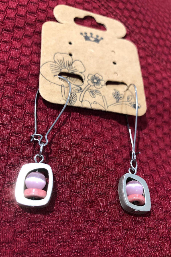 Boucle d'oreilles argent et rose seconde main Autres