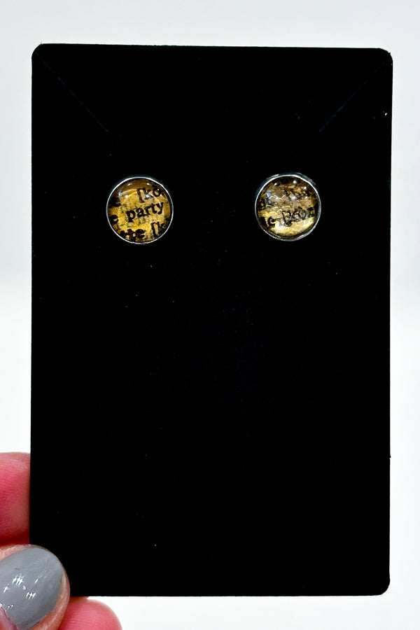 Boucles d'oreilles découpure magazine seconde main Autres