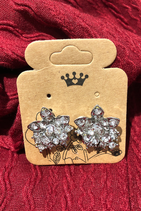 Boucles d'oreilles fleur en diamant seconde main Autres