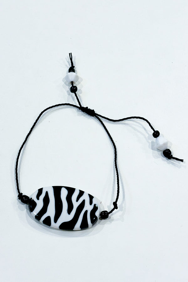 Bracelet noir zébré seconde main Autres