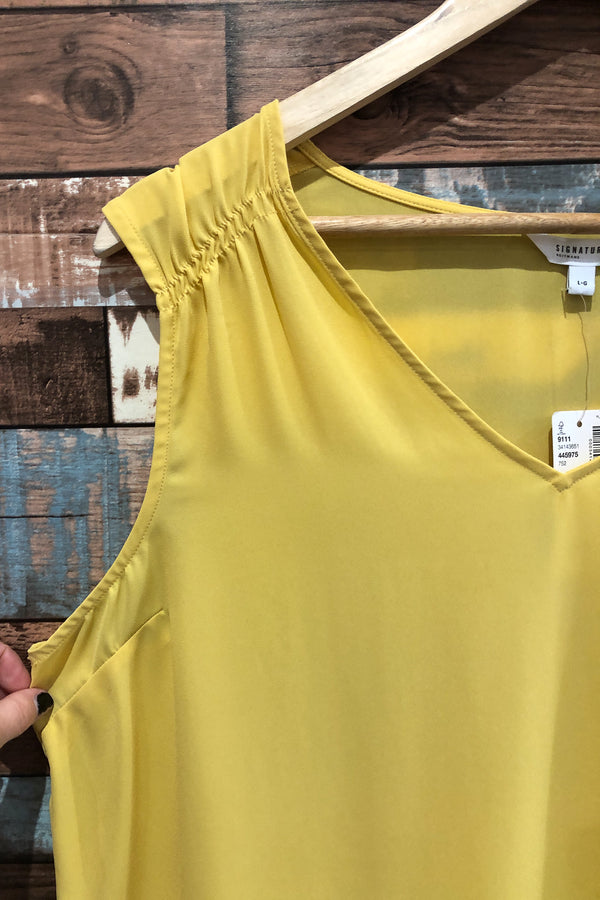 Camisole fluide jaune légèrement transparente (l) seconde main Reitmans