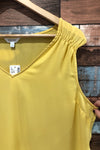 Camisole fluide jaune légèrement transparente (l) seconde main Reitmans