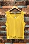 Camisole fluide jaune légèrement transparente (l) seconde main Reitmans