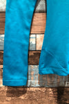 Chandail de sport turquoise avec capuchon (xs) seconde main Under Armour