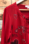 Chandail rouge ''Love'' avec bande rayée noire et blanche au bas (xl) seconde main Grenier