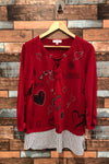 Chandail rouge ''Love'' avec bande rayée noire et blanche au bas (xl) seconde main Grenier