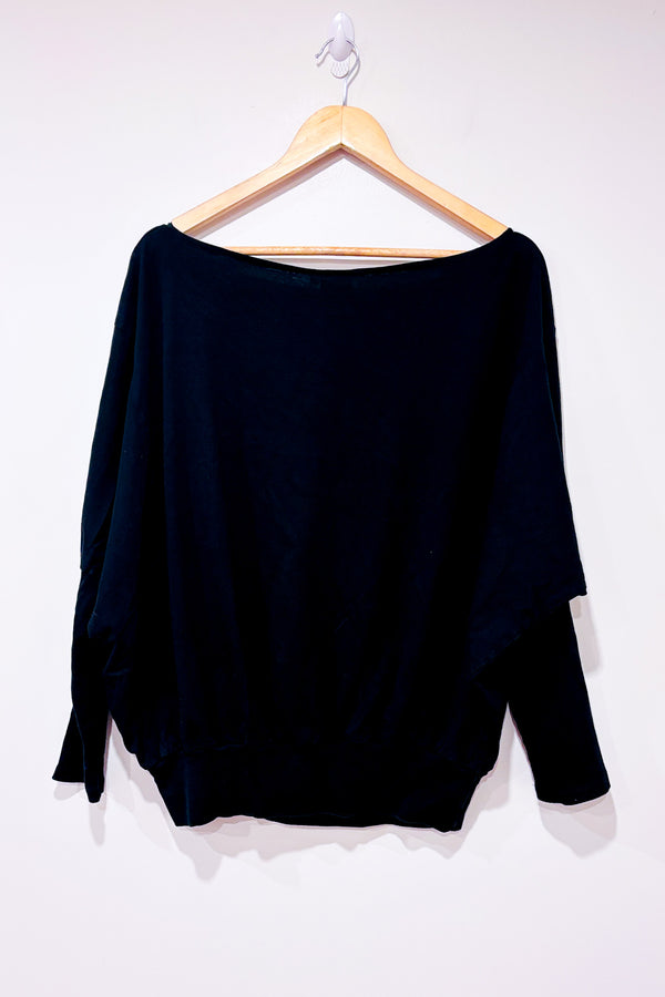 Chandail ample noir avec fleur blanche (xl)-Trop Belle Pour Toi-La Penderie du Paradis 🕊