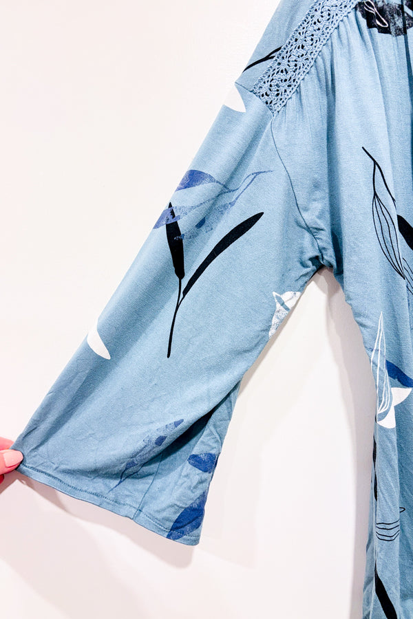 Haut turquoise fleuri (l) seconde main - Reitmans- La Penderie du Paradis