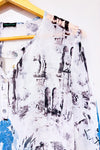 Blouse fluide transparente blanche motif artistique avec paillettes seconde main - Tricotto- La Penderie du Paradis