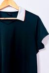 Polo de sport noir à col blanc contrastant seconde main - Oakley- La Penderie du Paradis