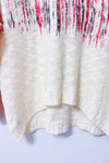 Chandail crème et rouge à ourlet asymétrique seconde main - Liky- La Penderie du Paradis