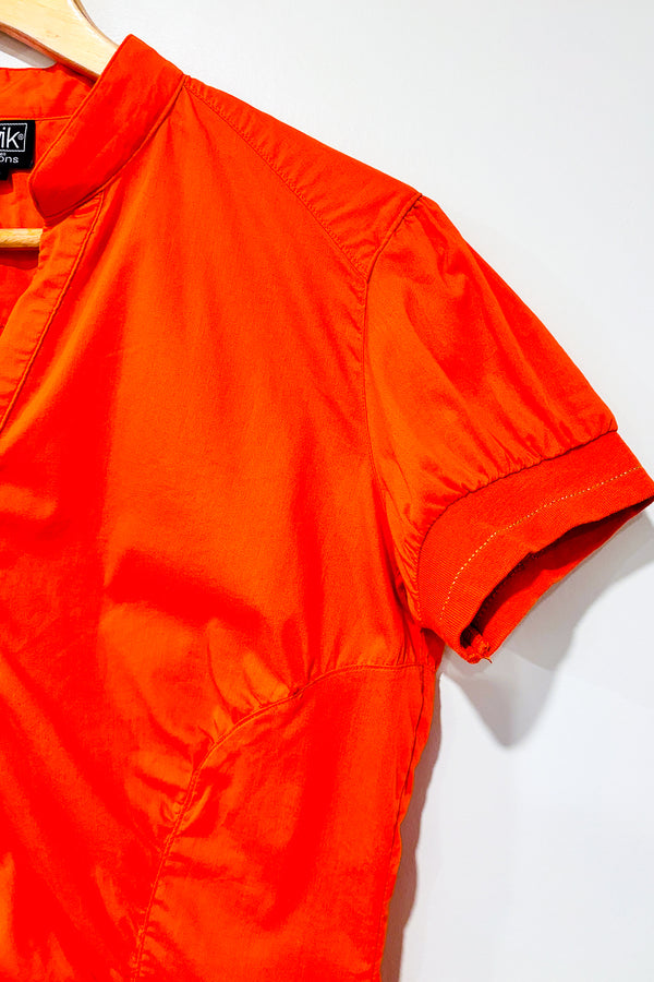 Chemise orange à manches courtes (l) -- La Penderie du Paradis ?