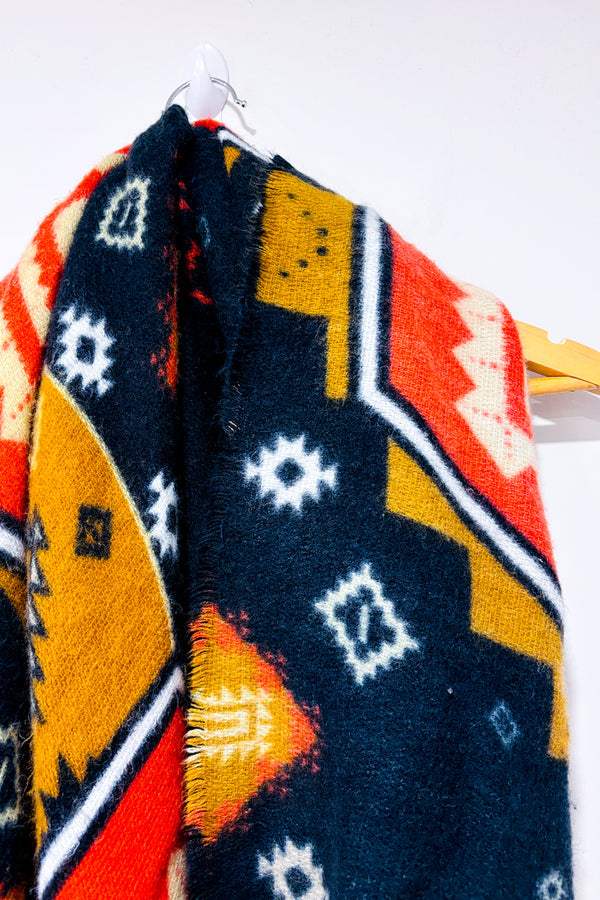 Écharpe oversized en tricot noir et orange à motifs géométriques seconde main - Misk- La Penderie du Paradis