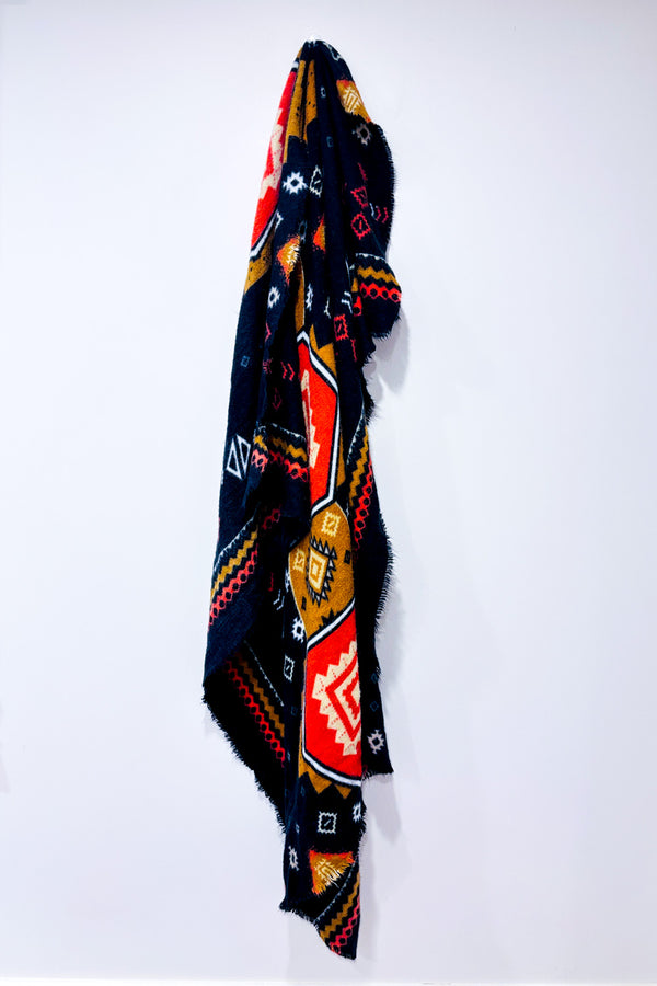 Écharpe oversized en tricot noir et orange à motifs géométriques seconde main - Misk- La Penderie du Paradis