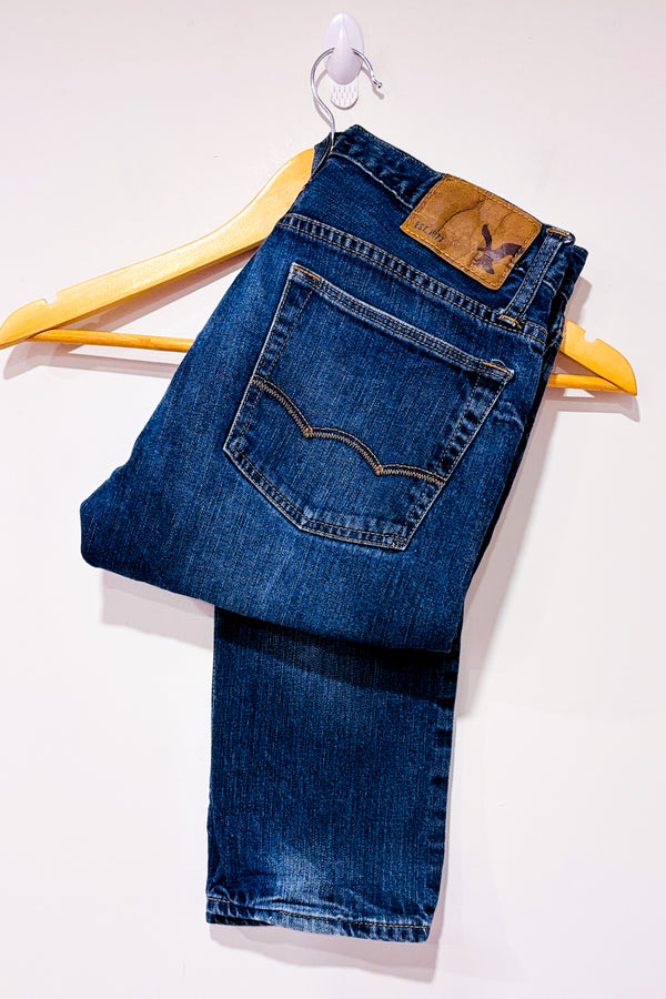 Jeans bleu foncé délavé (s) - Homme seconde main - American Eagle- La Penderie du Paradis