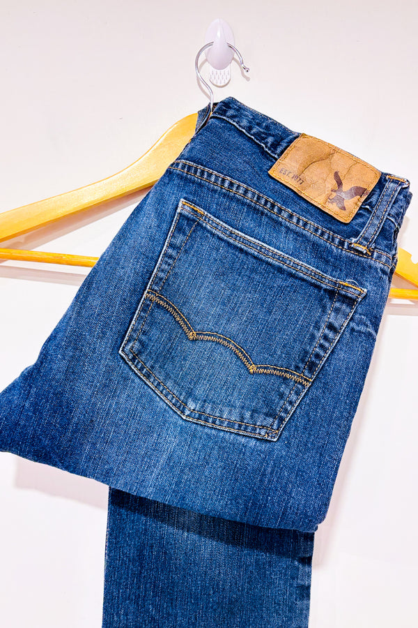 Jeans bleu foncé délavé (s) - Homme seconde main - American Eagle- La Penderie du Paradis