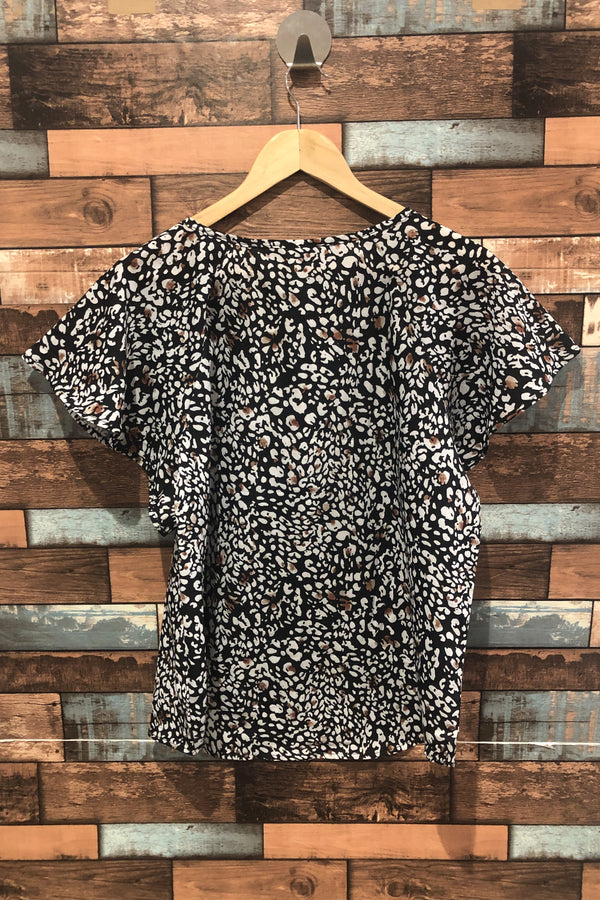 Haut ample noir avec motifs et manches fluides (m) seconde main Autres