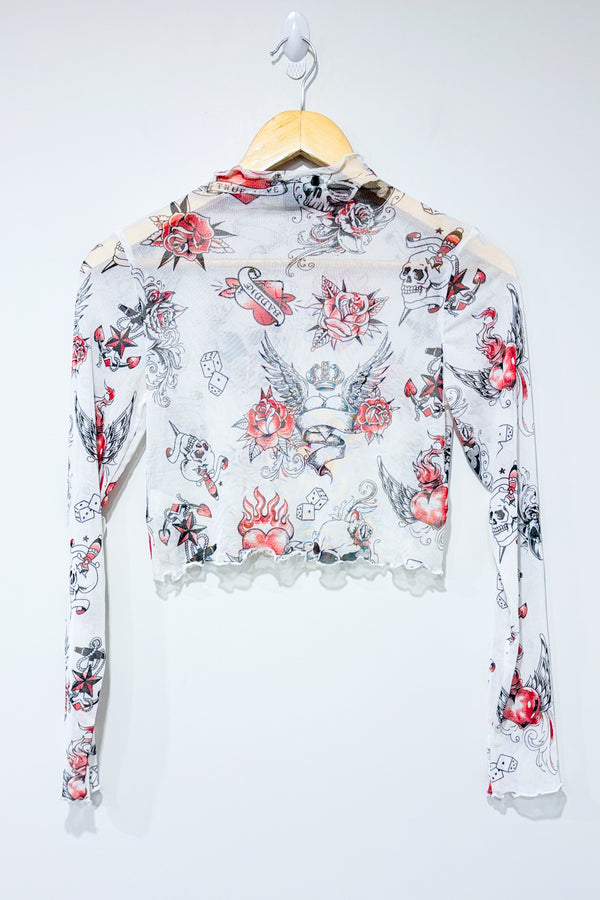 Haut court en maille blanc transparent motif tĂȘte de mort (m) -- La Penderie du Paradis ?