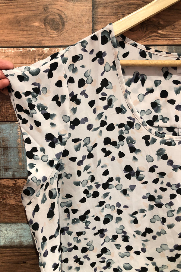 Haut fluide blanc avec motifs multicolores (xxl) seconde main Reitmans