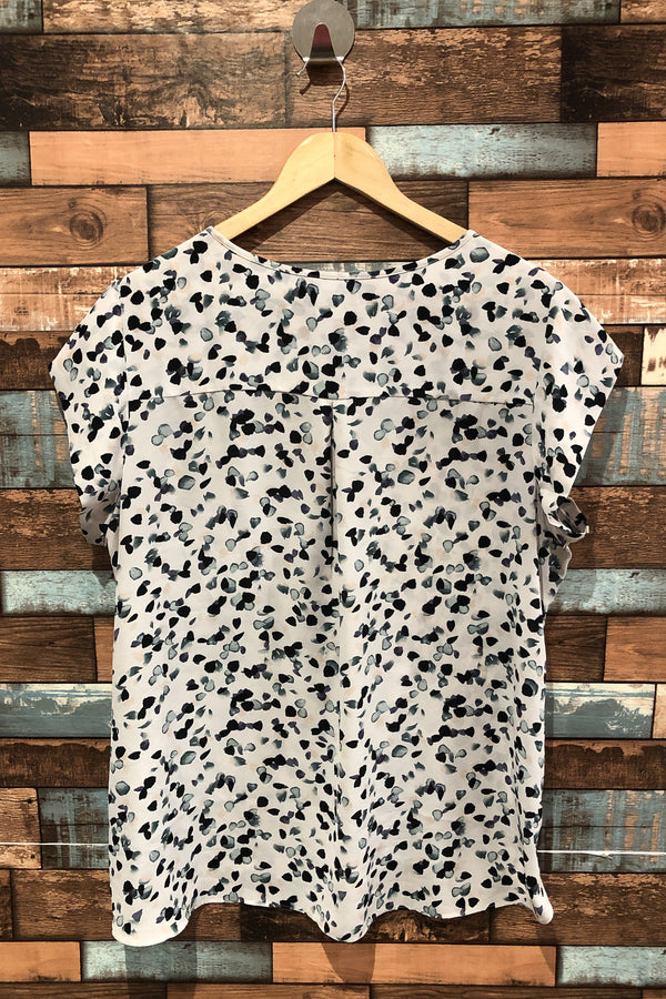 Haut fluide blanc avec motifs multicolores (xxl) seconde main Reitmans