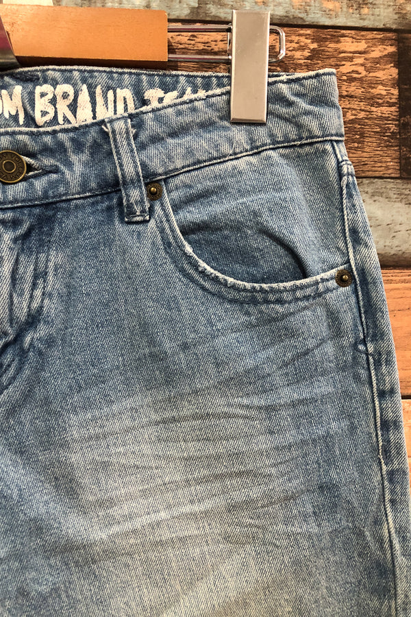 Jeans bleu délavé (s) seconde main Volcom