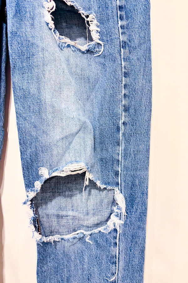 Jeans bleu effet usé jambe droite (xs)-Garage-La Penderie du Paradis 🕊