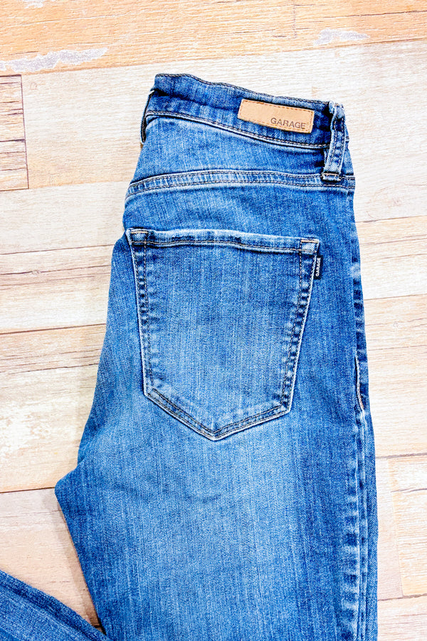 Jeans bleu pâle délavé jambe étroite (xs)-Garage-La Penderie du Paradis 🕊