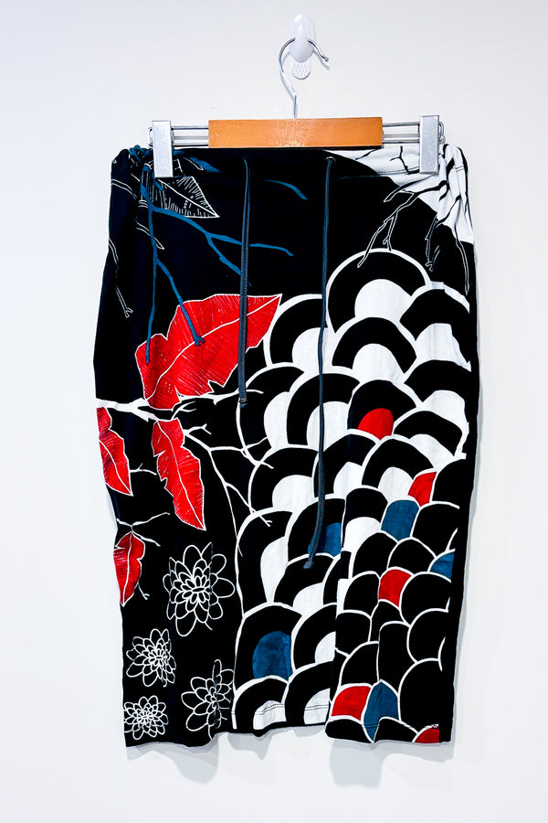 Jupe noire et rouge avec motifs (m) -- La Penderie du Paradis ?