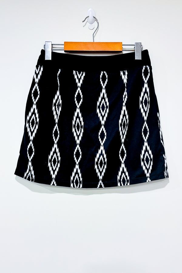 Jupe-short noire avec motifs blancs (xs) - Seg'ments - La Penderie du Paradis ?