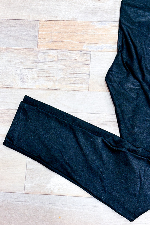 Legging noir lustré seconde main - Tokë- La Penderie du Paradis