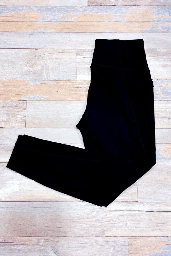 Legging noir à taille haute avec poches* seconde main - Lolë- La Penderie du Paradis