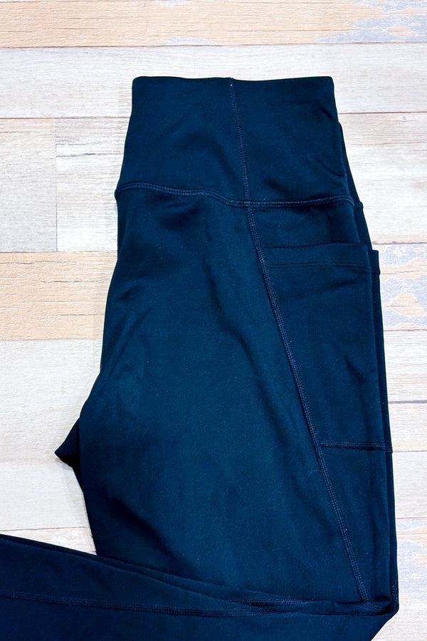 Legging noir à taille haute avec poches* seconde main - Lolë- La Penderie du Paradis